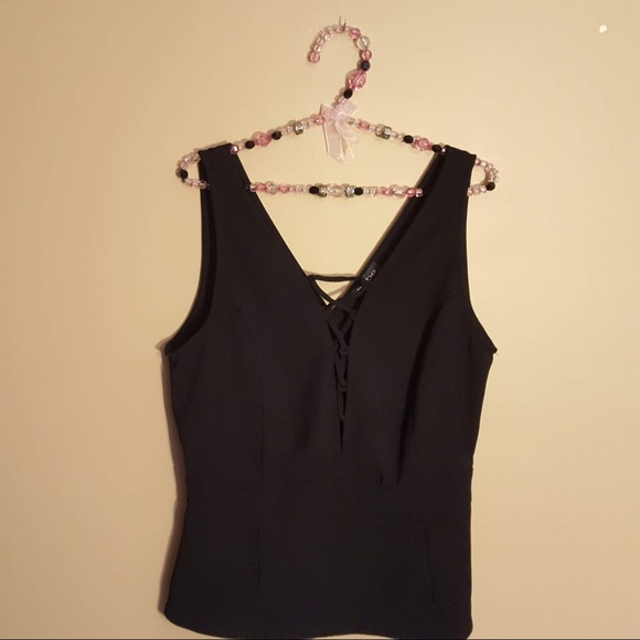 bebe Tops - NWT Bebe black lace up tank size large